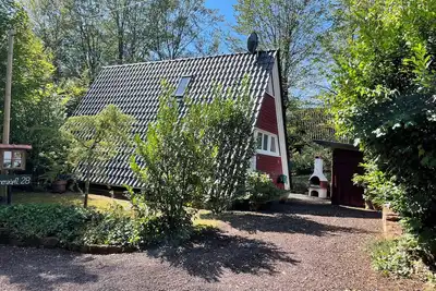 Image de Chalet confortable avec sauna extérieur et climatisation