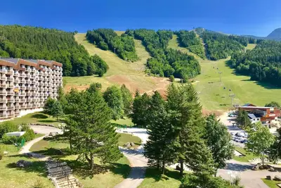 Image de Appartement rénové avec balcon exposé plein sud, proche commerces et parking gratuit
