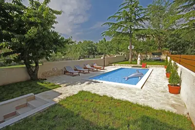 Image de Piscine, grill, WiFi, vélos, tennis de table, lave-vaisselle, lave-linge