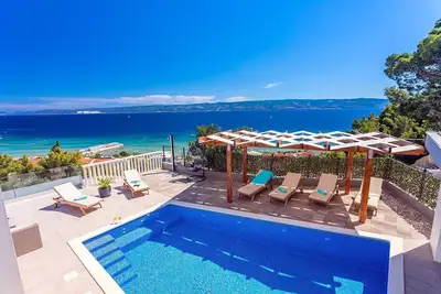Image de Villa Matan with a private 28m2 pool, billiards, table tennis, darts, Ps5, only 250m from the sandy beaches