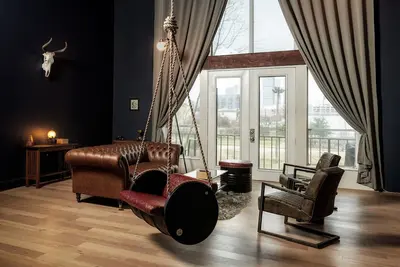 Image de Loft design avec balançoire intérieure