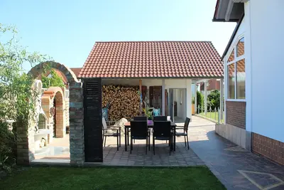 Image de Maison avec jardin d'hiver et terrasse