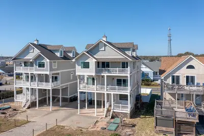 Image de Feeling Tip Sea à Carolina Shores, magnifique maison de 6 chambres avec piscine privée et bain à remous