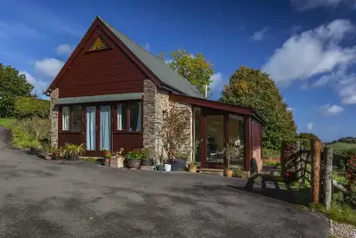 Image de Putham Barn, Cutcombe - chien amical