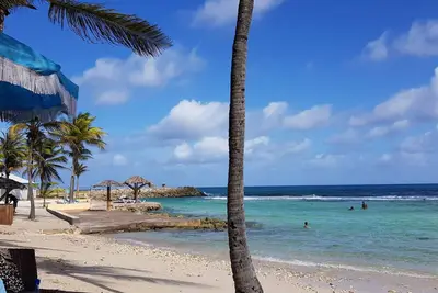 Appartement de standing 30m2 en bord de mer avec accés direct au lagon turquoise