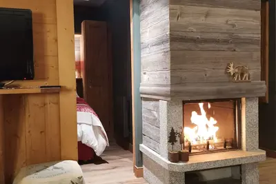 Image de Appartement Luxe avec cheminée dans Chalet RÉSIDENCE classé *****