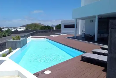 Image de Villa Rayito. Villa moderne et spacieuse, piscine chauffée et belles vues