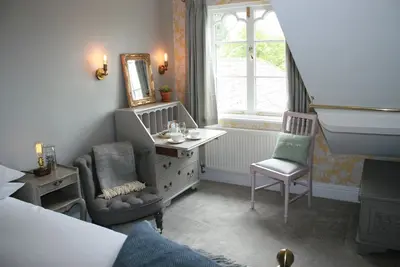 Image de Charmante suite 1 chambre à l'avant-toit.