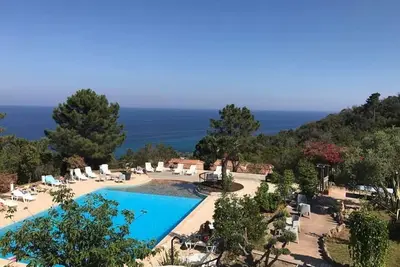 Charming mini villas with sea Or garden views and swimming pool in Solenzara.
