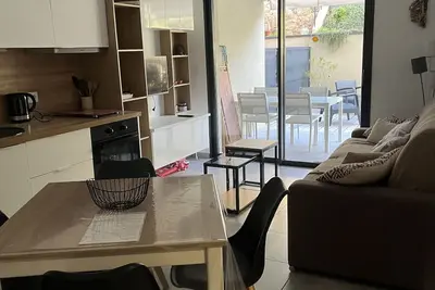 Image de Appartement tout confort au Rdc avec terrasse couverte et terrasse bois