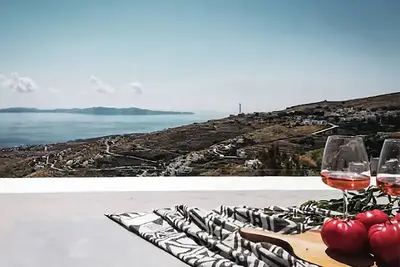 Image de Charmante maison en pierre à proximité des plages, des restaurants et plus à Tinos