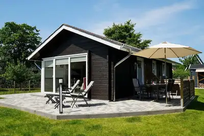 Image de Charmante maison en bois dans un endroit de rêve à seulement 660m de la plage de la mer Baltique