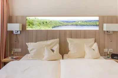 Image de Double Jay (26-30 m²) - Hôtel Schneider am Maar