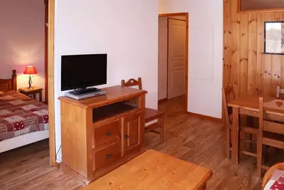 Image de Appartement de standing avec piscine chauffée, sauna et accès skis aux pieds