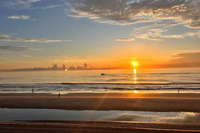 Image de Coffee with the dolphins after a gorgeous sunrise - Ponce Inlet Paradise!