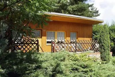 Image de Maison au bord du Grundlossee avec bateau