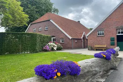 Image de Maison à Strackholt avec piscine chauffée