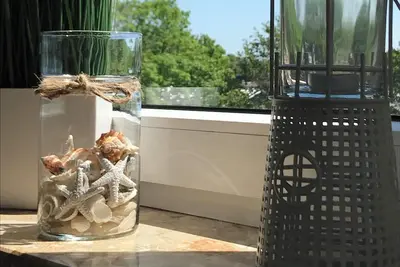 Image de Récemment rénové, 1. Rangée avec vue sur le lac, balcon sud et ouest, garage à vélos, sauna
