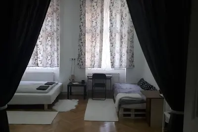 Image de Appartement Cette chambre familiale dispose d'une entrée privée, de la climatisation et d'une bouilloire électrique.
