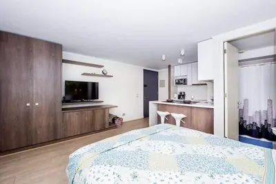 Image de Studio Arauco avec piscine intérieure, salle de sport, à côté des magasins