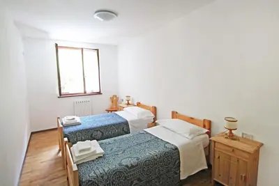 Image de Joli appartement avec piscine, Wifi, Tv, terrasse, animaux admis et parking, près de Riva Del Garda