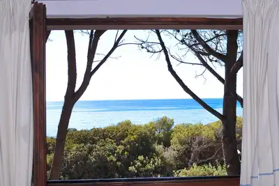 Image de Villa directement sur la plage de Santa Margherita Pula pour 12 personnes
