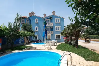 Image de Bel appartement pour 5 personnes avec piscine, climatisation, Tv, terrasse, animaux admis et parking