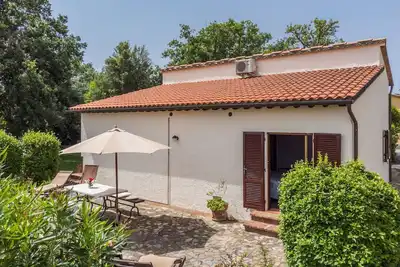 Image de Appartement dans une maison de vacances avec piscine, climatisation, Wifi, patio, vue panoramique