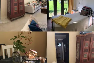 Image de Le «Hidden Cottage», une retraite paisible à la campagne, surplombant les champs et les jardins.