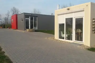 Image de Appartement micro maison avec 1 chambre et vue sur le jardin
