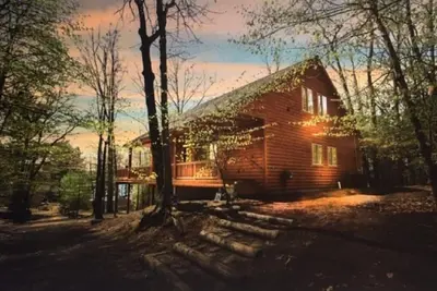 Image de Belle maison en bois rond Spider Lake, Traverse City pour 16 personnes + location de bateaux