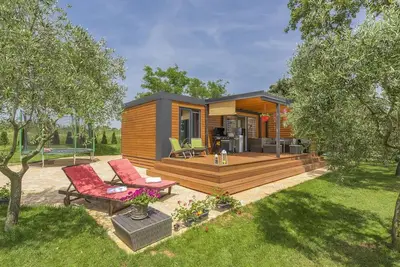 Image de Beach house Ive avec plage privée avec jacuzzi, piscine, aire de jeux, kayak, . . .