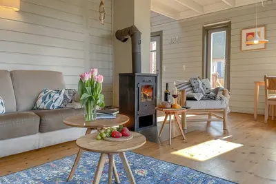 Image de Maison de pilote de rêve sur la mer Baltique avec sauna, cheminée, bateau à rames