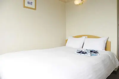 Image de Lit spacieux non-fumeur Chambre semi-double Connexion Lan gratuite / Yonezawa-shi Yamagata