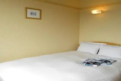 Image de Smoking relaxing bed Semidouble room L / Yonezawa Yamagata