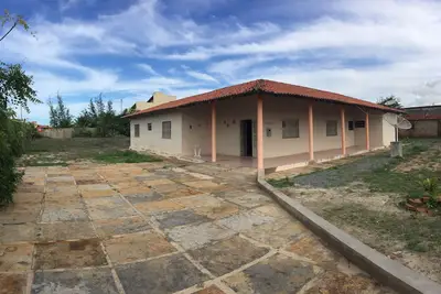 Image de Maison à Coqueiro, avec 4 chambres, climatisation, douche électrique et puits