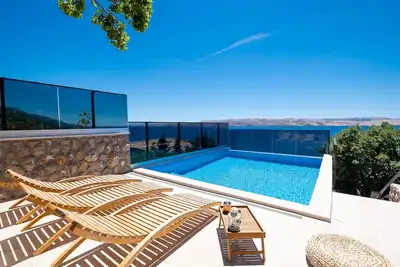 Image de Apartmani Matea avec piscine à débordement