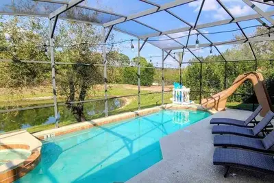Image de Magical 7bed / 5bath Home w / salle de jeux à 6 km de Disney (navette comprise)
