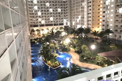 Image de Hip and Cozy 1 Br w \/ Balcony and pool view at Shore Residences Moa