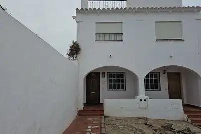 Image de Maison de ville avec Wifi à distance de marche de la plage