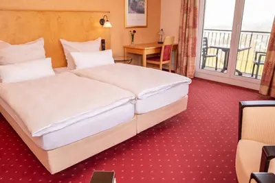 Image de Chambre double deluxe vue Munterley - Hotel Löwenstein