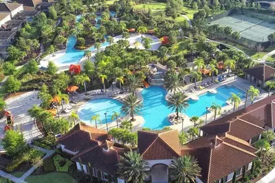Image de 6br moderne, piscine privée orientée au sud \/ Spa, Lazy River - Près de Disney!