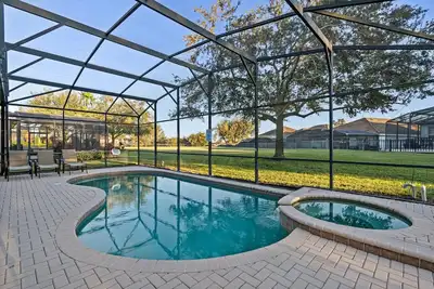 Image de Luxueuse maison de 5 chambres et 5 salles de bains avec piscine dans le Windsor Hills Resort près de toutes les attractions d'Orlando!