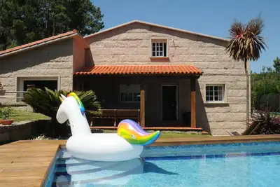 Image de Maison avec piscine à côté de la plage
