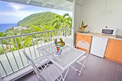 Image de Duplex \"O Coeur de Deshaies\", Duplex Cacao. Chambre avec vue mer. Clim. Piscine. Parking
