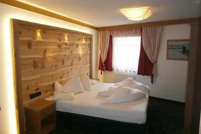 Image de Chambre double petite - The Kaltschmid Familotel Tirol