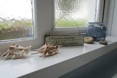 Image de \"Little Nook\", maison accueillante et accueillante Ă Dunseverick, sur la Causeway Coast