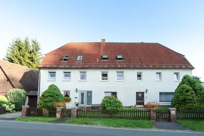 Image de Appartement Hertel - Appartement à l'étage supérieur avec un grand balcon terrasse