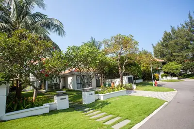Image de Magnifiques villas avec piscine et vue sur le parcours de golf au Beach Resort