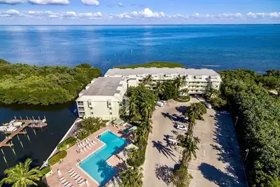 Image de Appartement de vacances Ă Captiva Island Bayside. Piscine, plage, tennis, WiFi